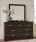 Covetown King Panel Bed with Mirrored Dresser, Chest and 2 Nightstands